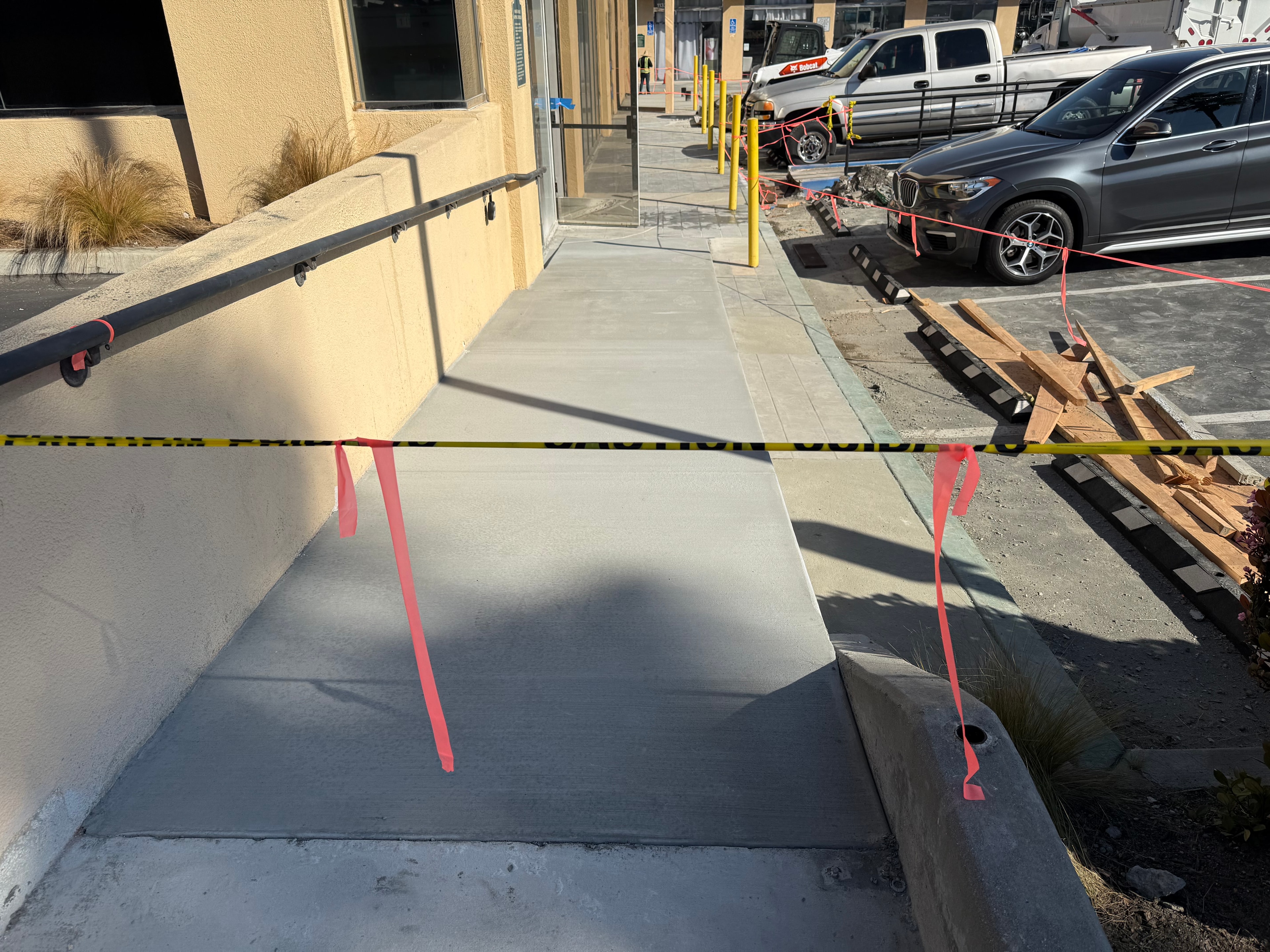 Manhattan Beach Mall ADA Improvement - Additional detail image 2 of ADA-compliant ramp and sidewalk upgrade for commercial mall access.